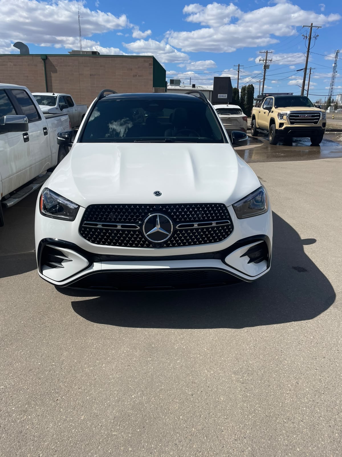 White luxury SUV with freshly washed exterior