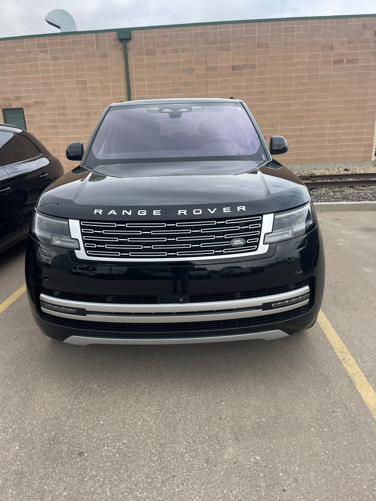 Detailed black luxury SUV with clean bodywork