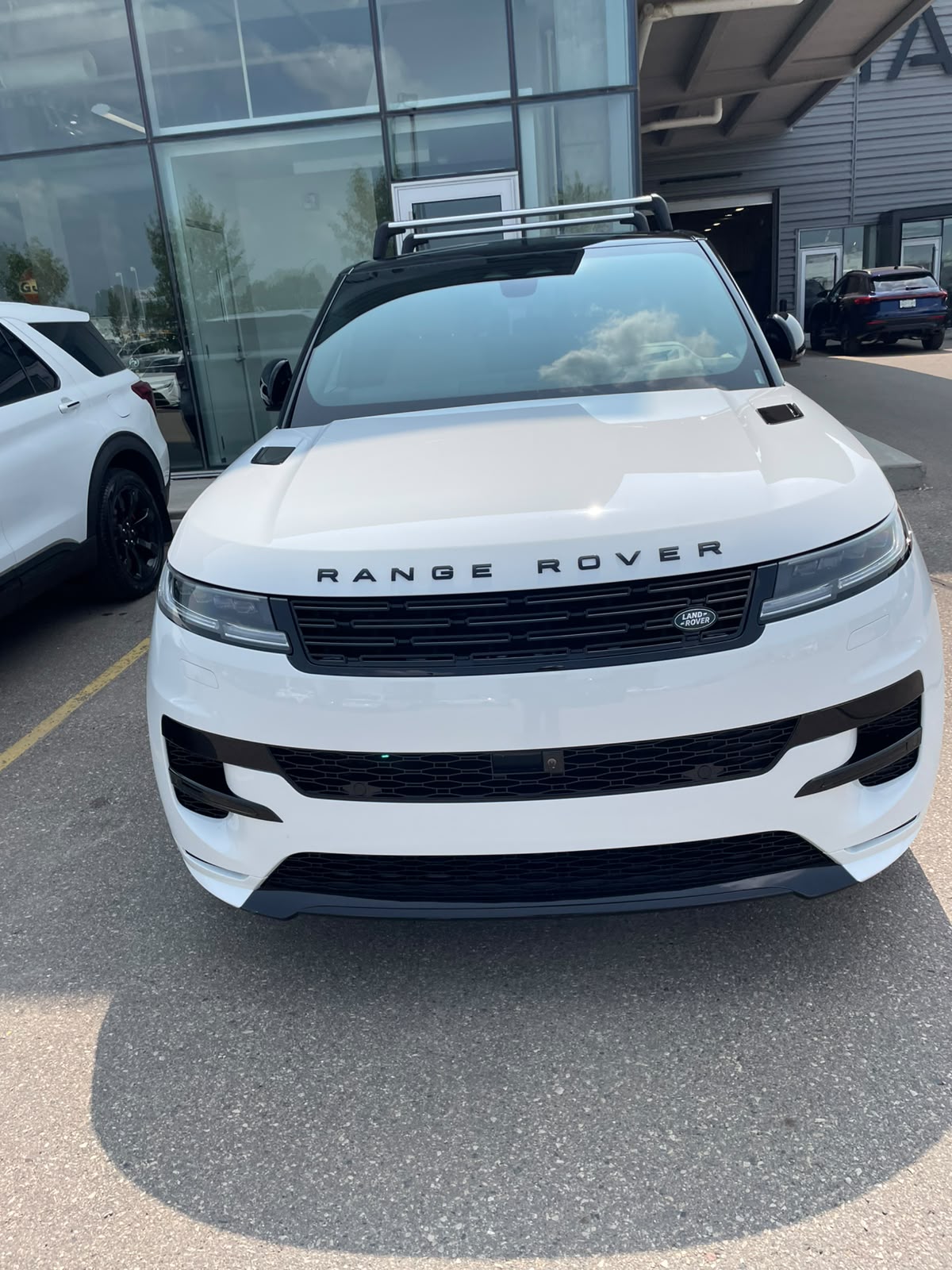 White luxury SUV with freshly detailed exterior